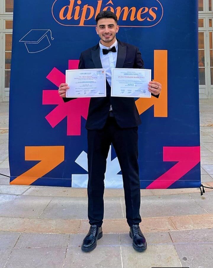 HHS III alumnus celebrating an academic achievement