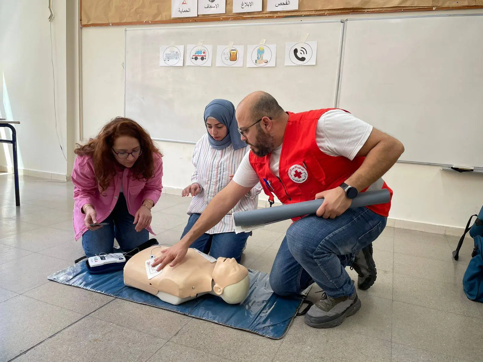 Students learning first aid skills