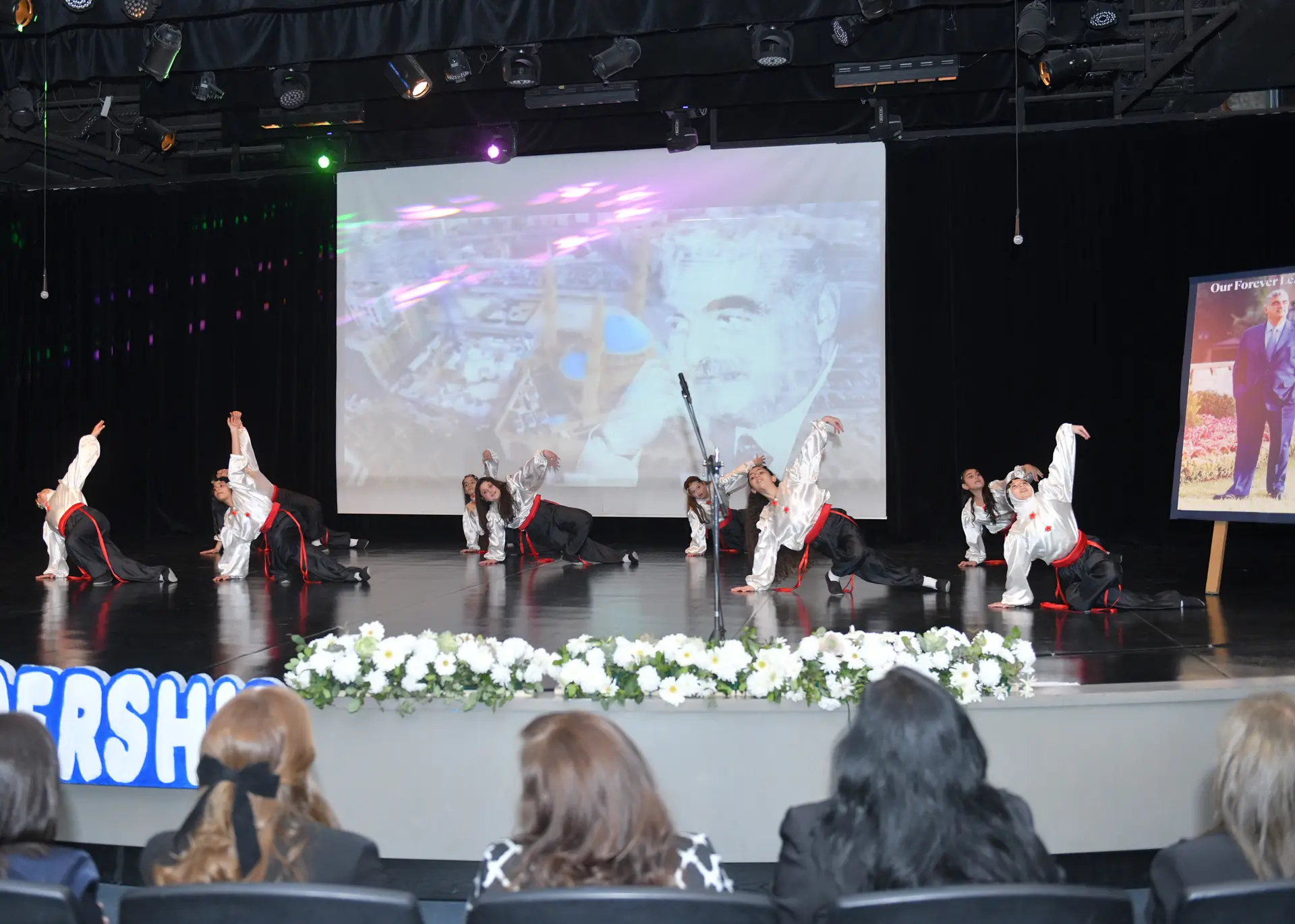 Students performing together on stage